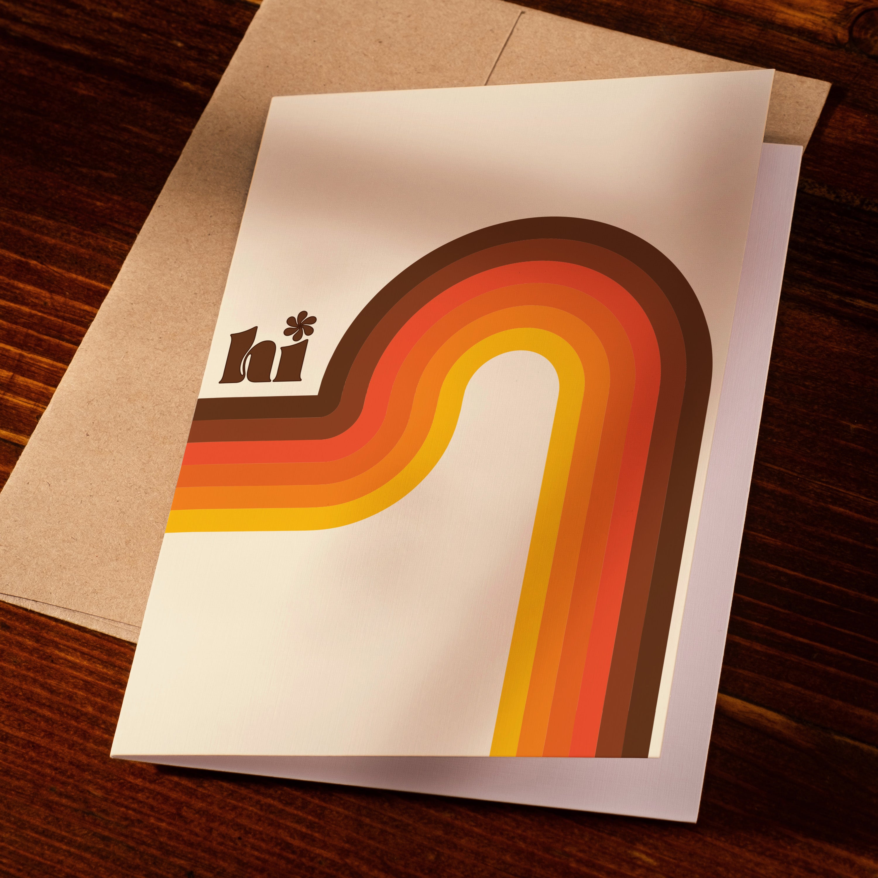 greeting card with the word hi and a retro brown and orange wave on cover